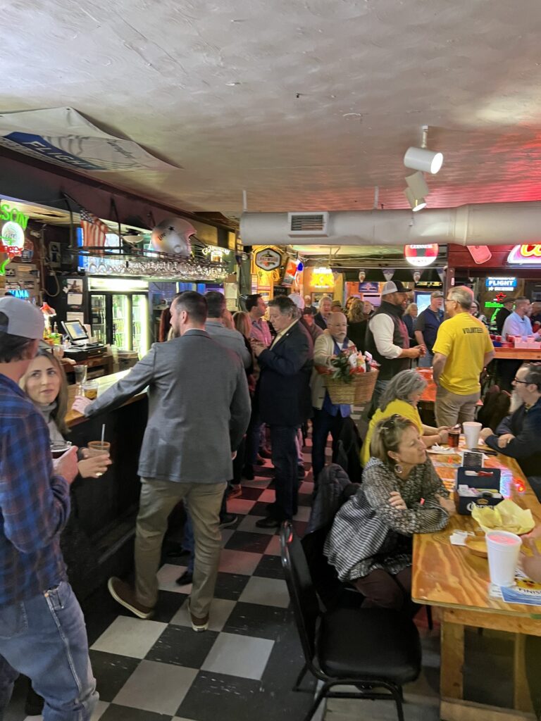 Arlington Sunrise Rotary members at an evening social, January 2026