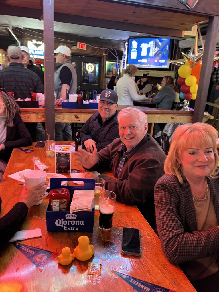 Arlington Sunrise Rotary members at an evening social, January 2026