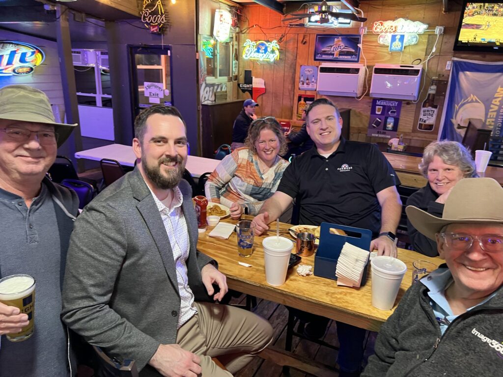 Arlington Sunrise Rotary members at an evening social, January 2026