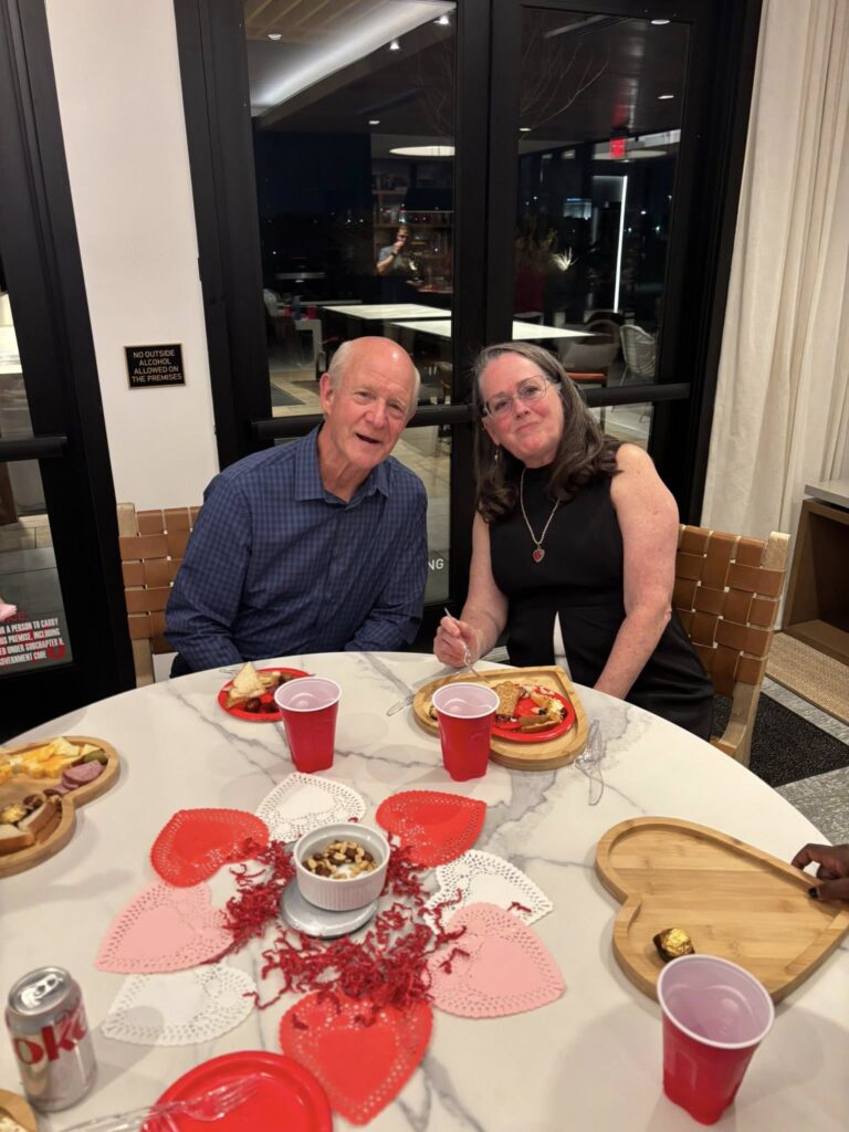 Two Arlington Sunrise Rotarians at a Valentine-themed evening social