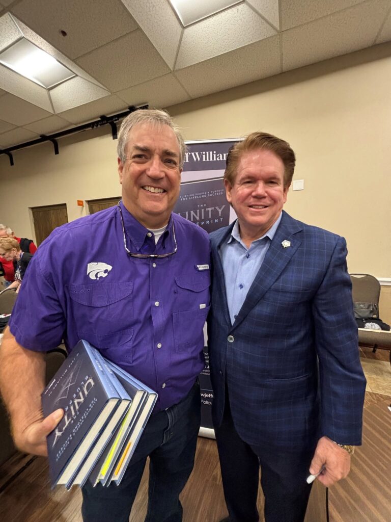 Two Arlington Sunrise Rotarians with a guest speaker at a Friday meeting