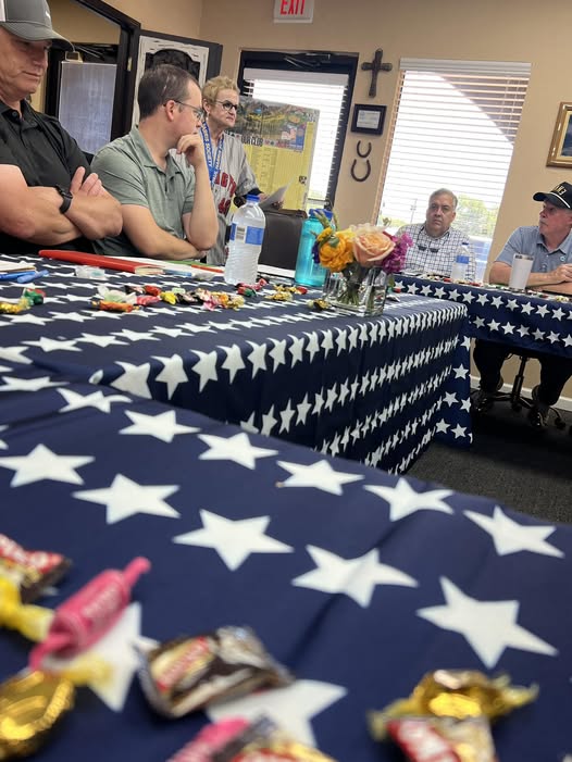 Star-print tablecloths and treats set for an Arlington Sunrise Rotary meeting