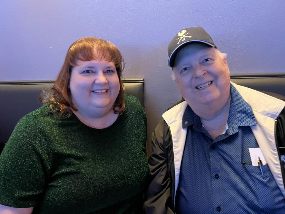 Two Arlington Sunrise Rotarians at the club holiday party