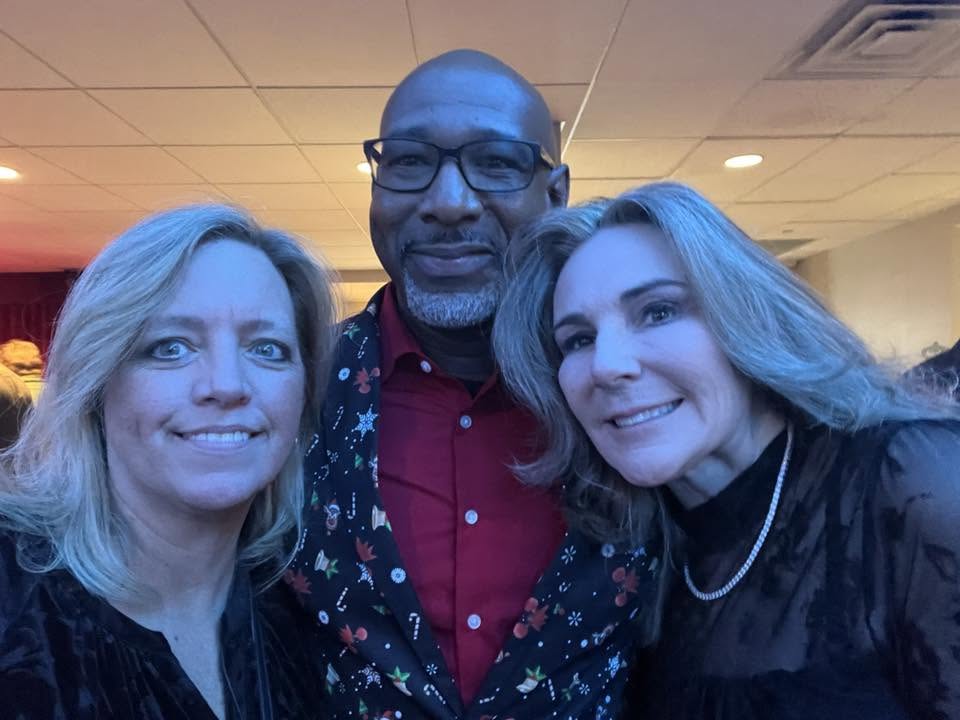 Arlington Sunrise Rotarians in holiday attire at the club party