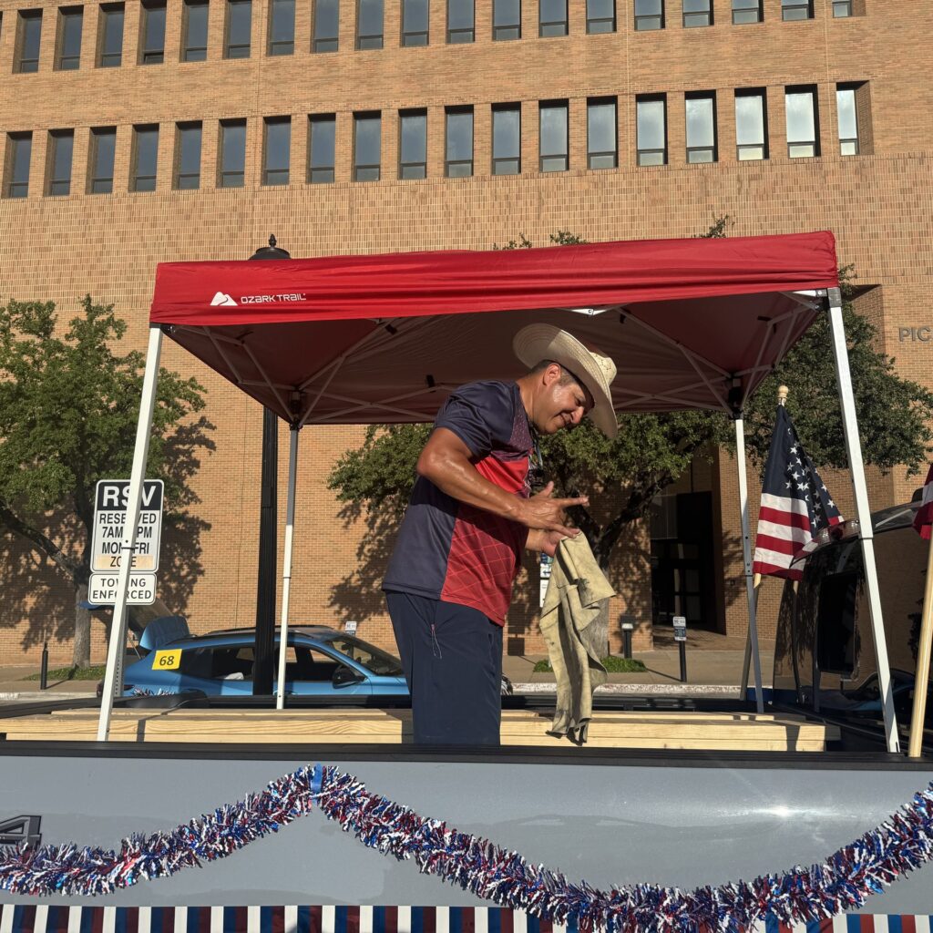 Arlington Sunrise Rotary members in the Fourth of July parade in downtown Arlington