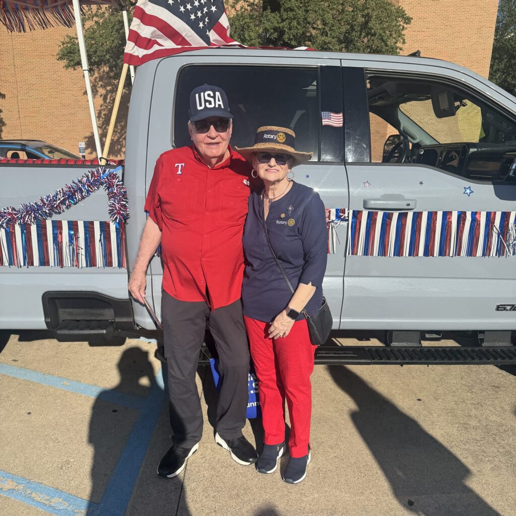 Arlington Sunrise Rotary members in the Fourth of July parade in downtown Arlington