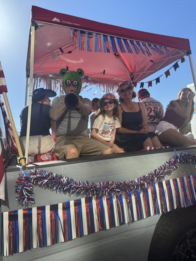 Arlington Sunrise Rotary members in the Fourth of July parade in downtown Arlington