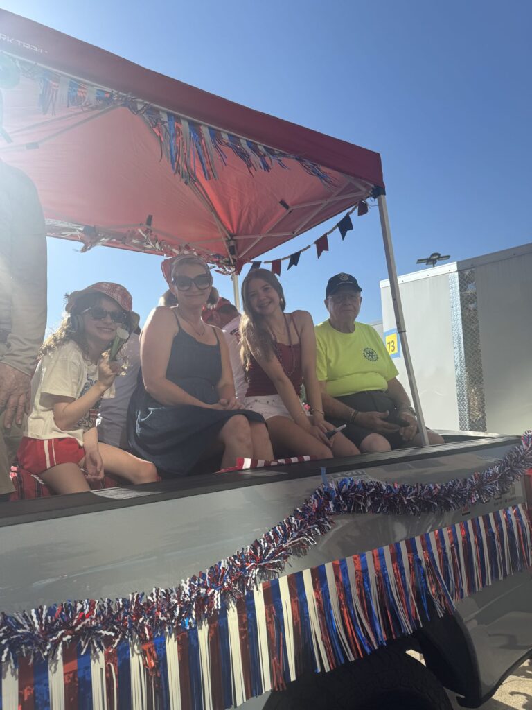 Arlington Sunrise Rotary members in the Fourth of July parade in downtown Arlington