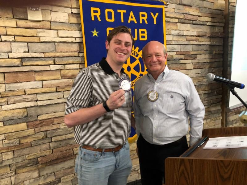 A new member receives his Blue Badge